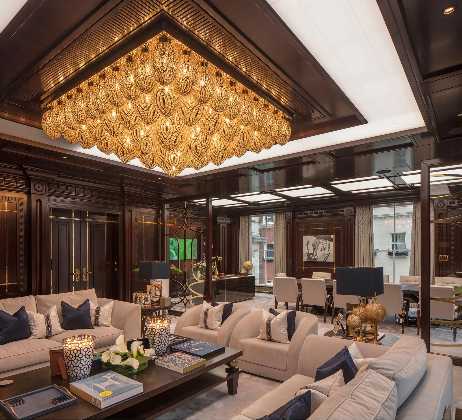 Panelled lounge with illuminated ceiling feature by NOOR